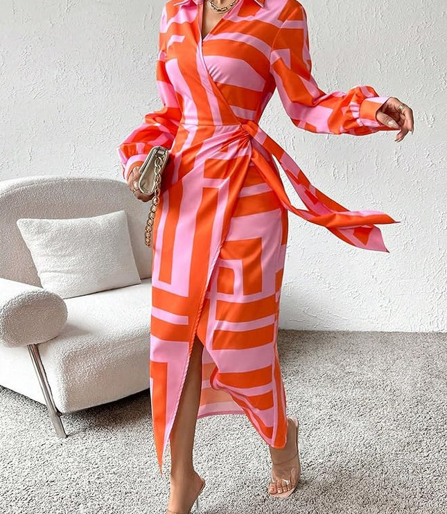 Women's long sleeve V-neck midi dress in a striking orange and pink geometric block print, with a high slit and tie waist.