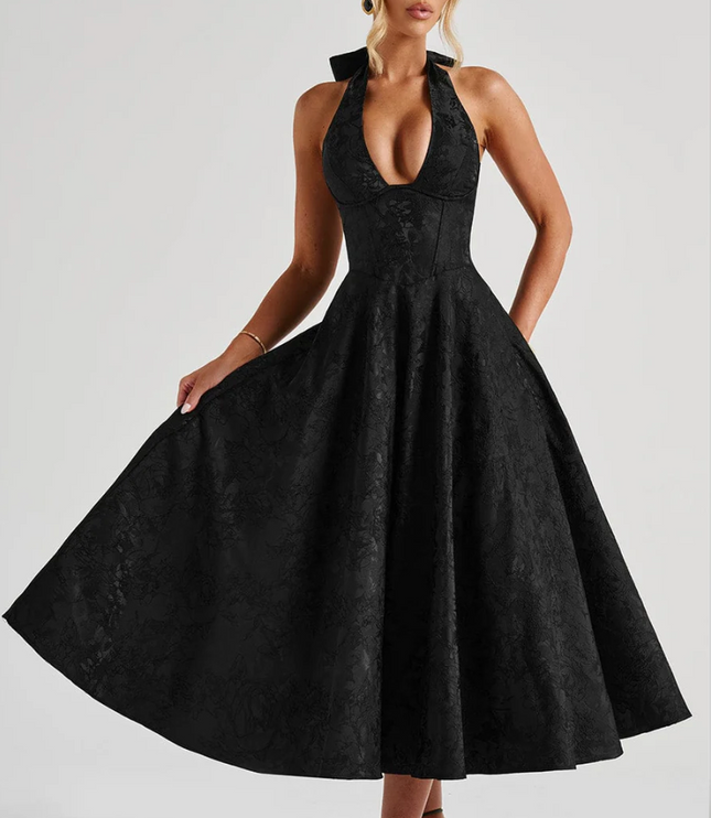 Elegant black jacquard midi dress featuring a halter v-neckline and a flowing A-line skirt, ideal for prom or evening wear.