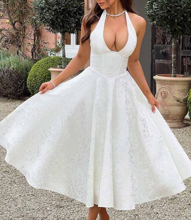 White jacquard halter v-neck midi dress with a flowing skirt and deep neckline, suitable for prom.
