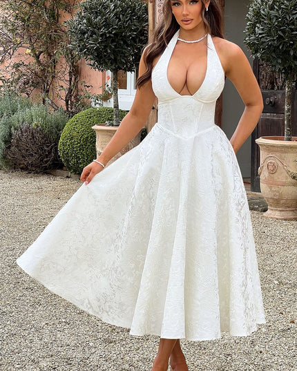 Front view of a white jacquard midi dress, showcasing the textured fabric and full skirt.