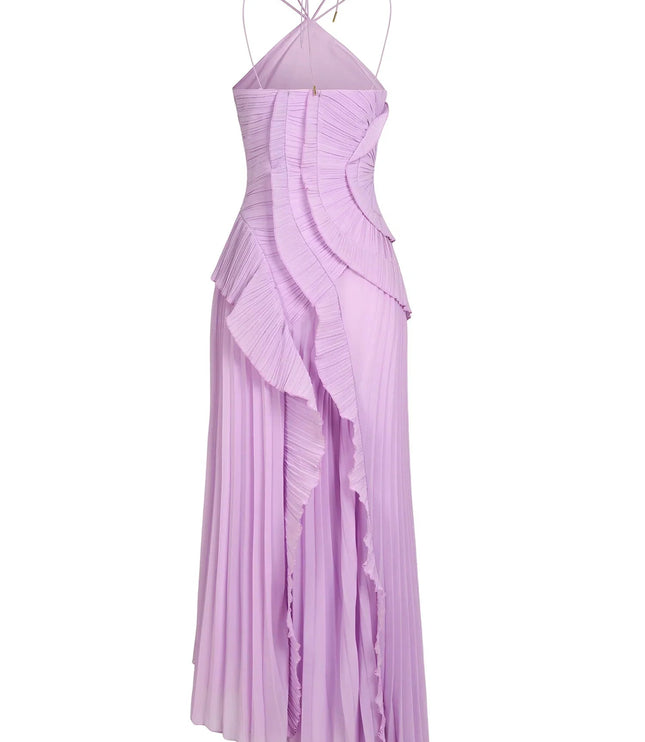 Back view of a lavender one-shoulder ruffle midi dress with a pleated skirt and adjustable halter straps.