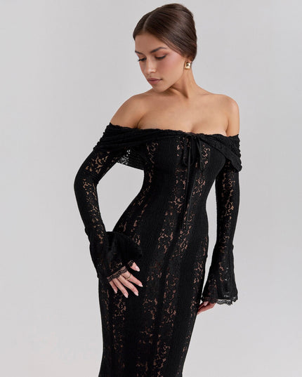 Close-up of the bodice and sleeves of a black off-shoulder floral lace maxi dress, showing the delicate lace detail.