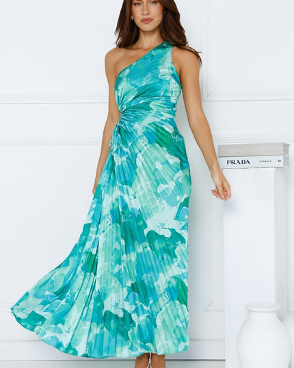 Women's elegant one shoulder maxi dress in a teal and aqua floral print, featuring a pleated skirt and waist cutout.
