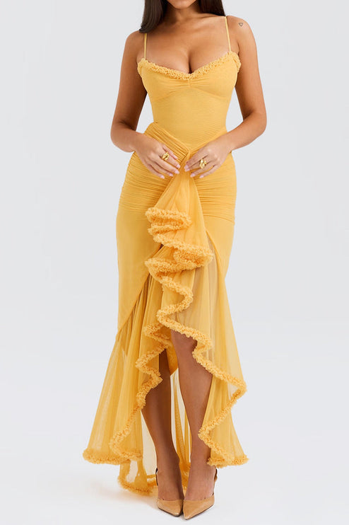 Close-up front view of the yellow ruffled maxi dress, highlighting the intricate front ruffles and ruched details on the bodice.