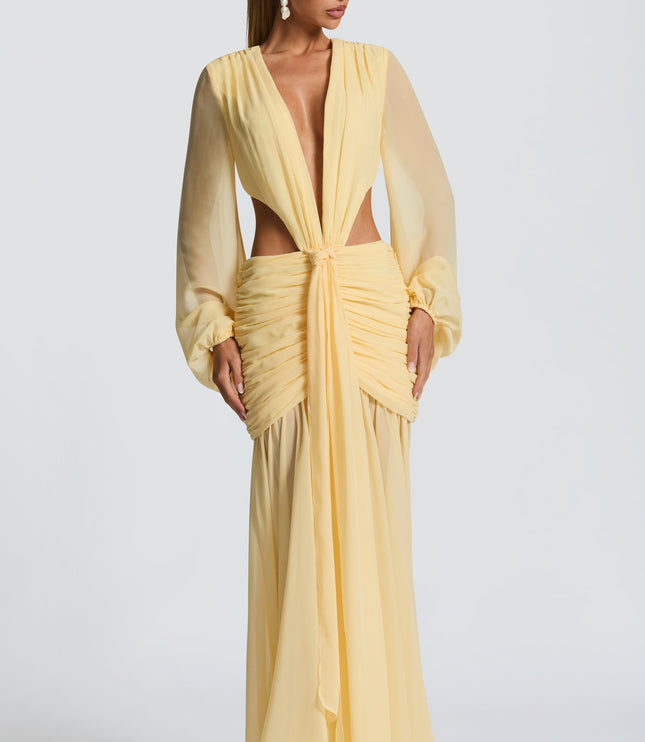 Full front view of a light yellow long sleeve V-neck cut-out maxi dress, ideal for prom or formal events.