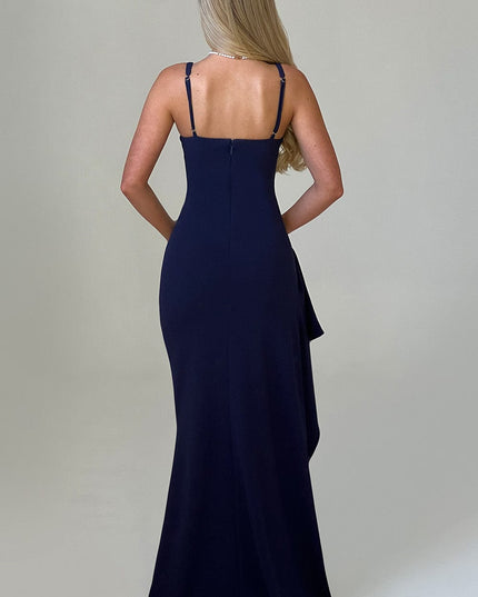 Back view of the navy blue prom maxi dress, showcasing adjustable spaghetti straps and zipper closure.