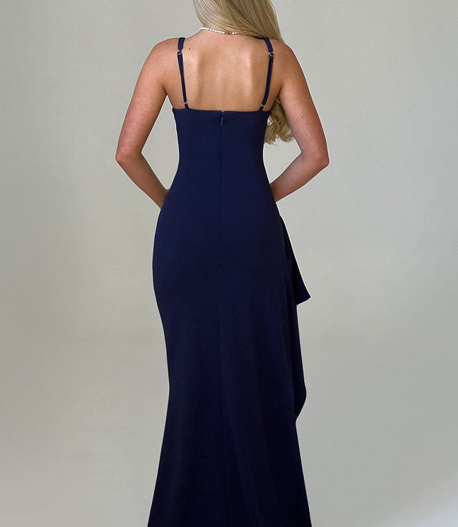 Back view of the navy blue prom maxi dress, showcasing adjustable spaghetti straps and zipper closure.