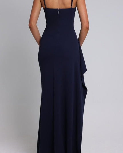 Back view of the navy blue maxi dress, detailing the adjustable straps and elegant silhouette.