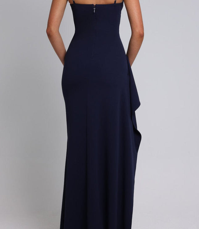 Back view of the navy blue maxi dress, detailing the adjustable straps and elegant silhouette.