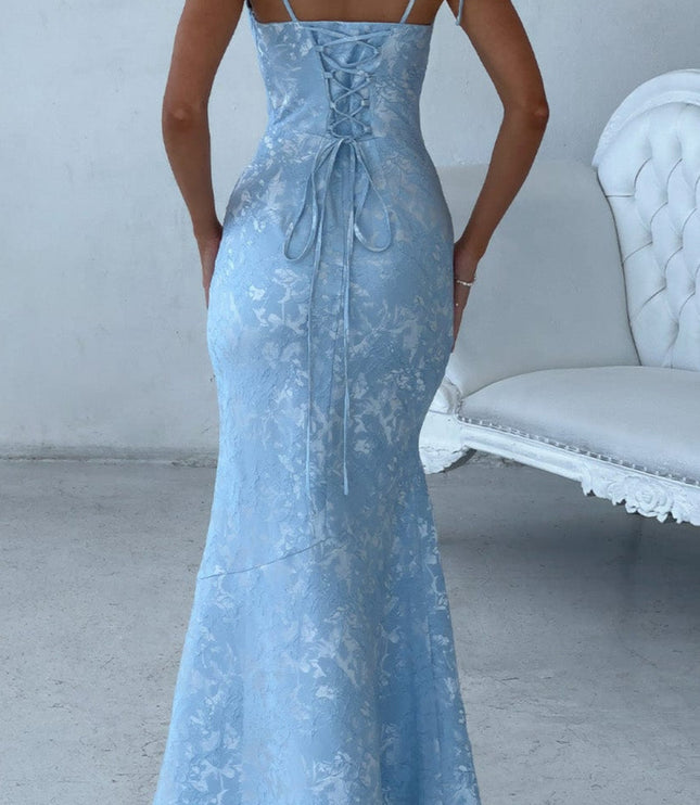 Rear view of light blue floral lace-up maxi dress, showcasing the intricate corset-style back detailing and mermaid hem.