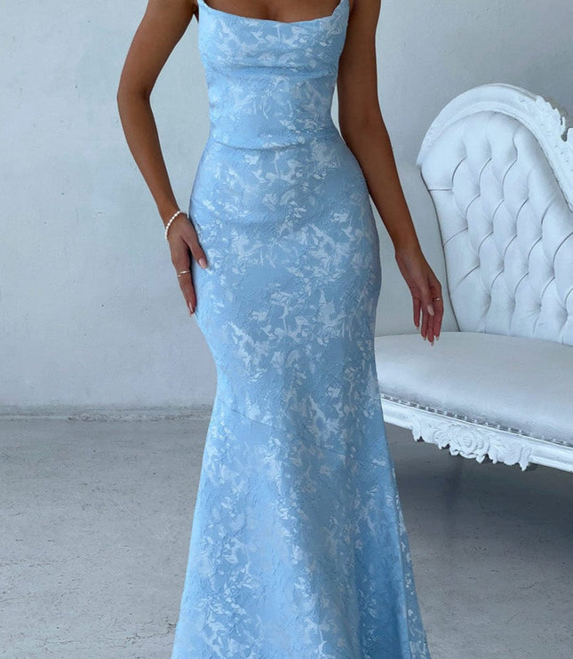 Front view of women's light blue floral maxi dress with tied shoulder straps and a fitted bodice, ideal for prom or formal events.