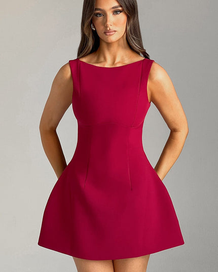 Front studio shot of the women's red high neck scoop back bubble mini dress, with a subtle sheen on the fabric.