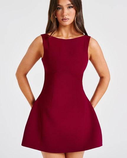 Front portrait view of the red high neck bubble mini dress, showcasing the elegant cut and vibrant color.