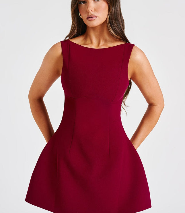Detailed front view of the women's red high neck bubble mini dress, highlighting the silhouette and fabric texture.