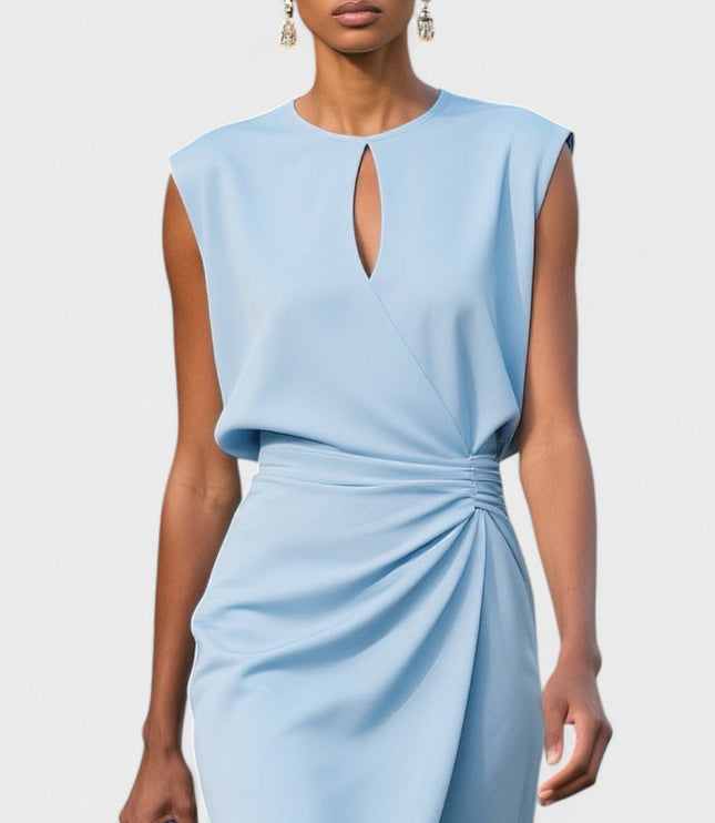 Close-up of light blue round neck keyhole midi dress with intricate draped waist detail, showcasing the fabric and tailoring.