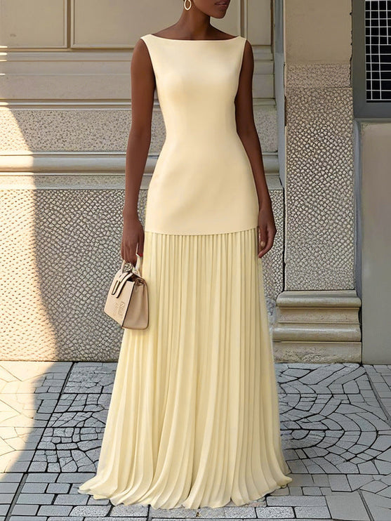 Pale yellow sleeveless boat neck maxi dress for women, showcasing a beautifully pleated full skirt.