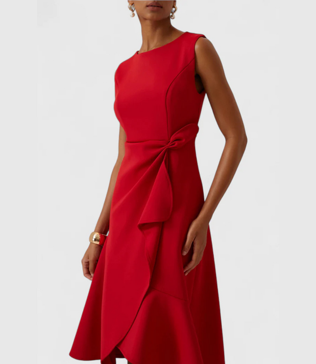 Close-up front view of a women's bright red sleeveless midi dress with a unique draped, knotted waist detail.