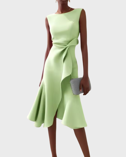 Soft mint green sleeveless midi dress with a contemporary draped asymmetric cut, showcasing a delicate side ruffle and a flowing hem.