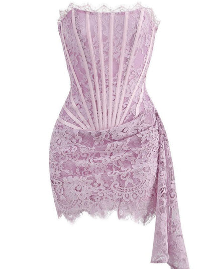 Front view of a light pink strapless lace corset mini dress with visible boning and elegant draped skirt.