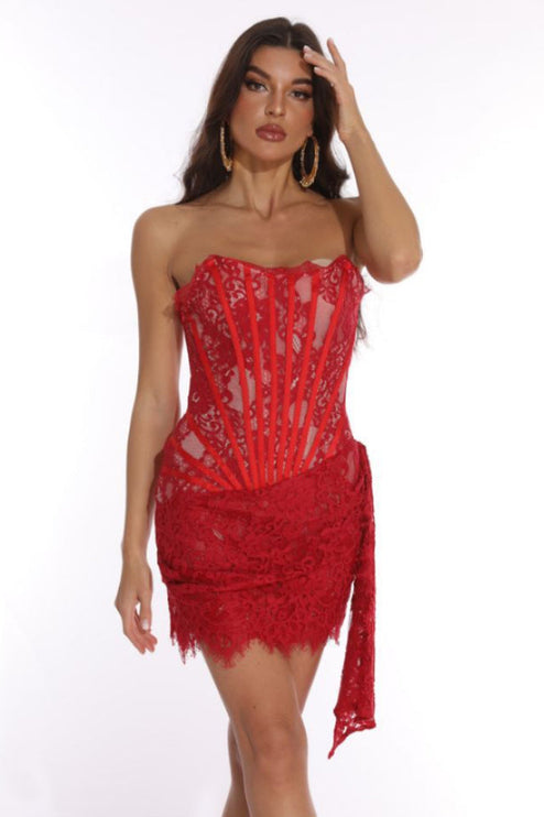 Front view of a vibrant red strapless lace corset mini dress with a draped side detail, for special occasions.