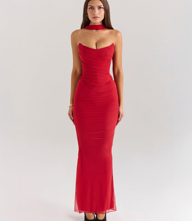 Front view of a vibrant red strapless mesh ruched maxi dress with a matching choker