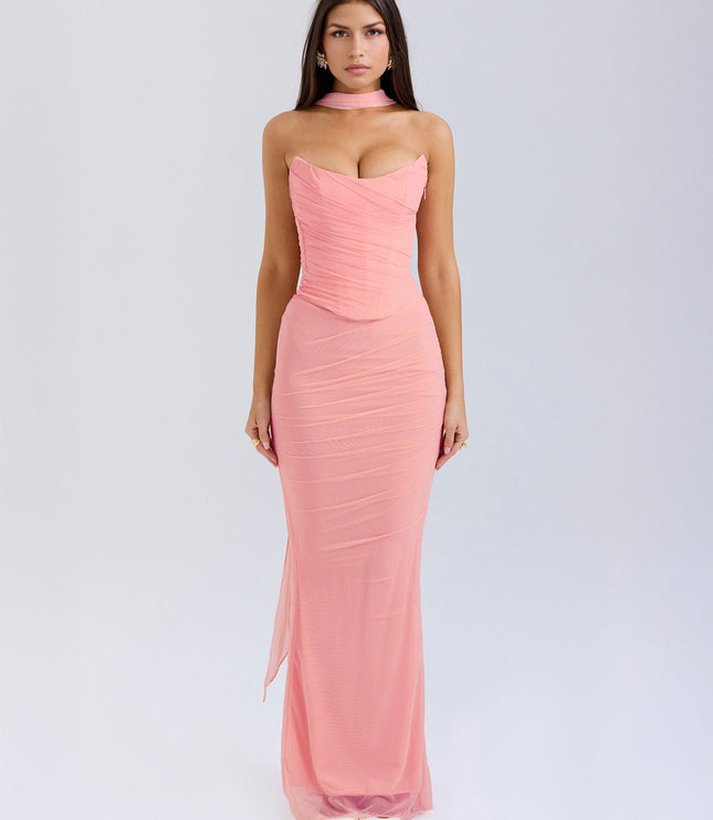 Full-length view of a women's strapless pink mesh ruched maxi dress with a choker detail, for special occasions.