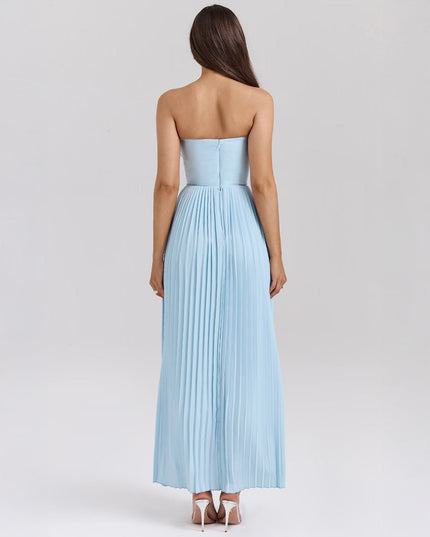 Back view of the light blue strapless pleated maxi dress, showing the full length of the skirt and zipper detail.