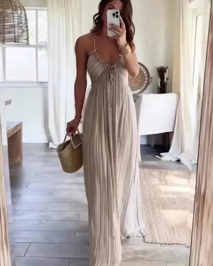 Women's summer backless striped U-neck maxi dress in light beige, showing the full length and flowing fabric.