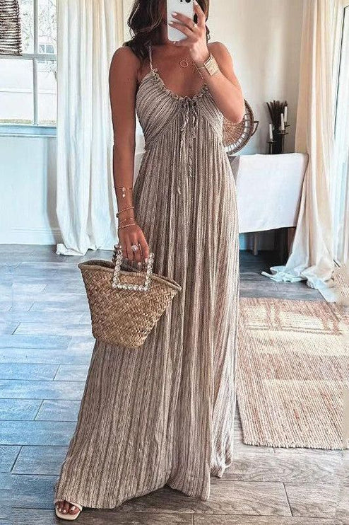 Full-body shot of the women's summer backless striped maxi dress in a neutral tone, with a U-neckline.