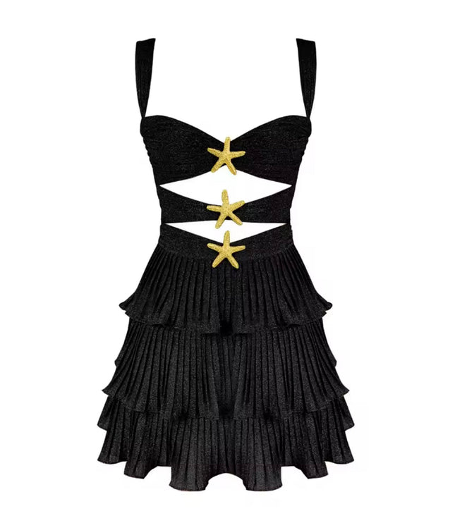 Black women's summer mini dress with gold starfish accents, cut-out waist, and tiered ruffle skirt