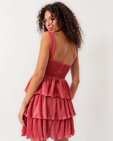 Back view of the women's coral summer mini dress showcasing the tiered ruffles and fitted bodice.
