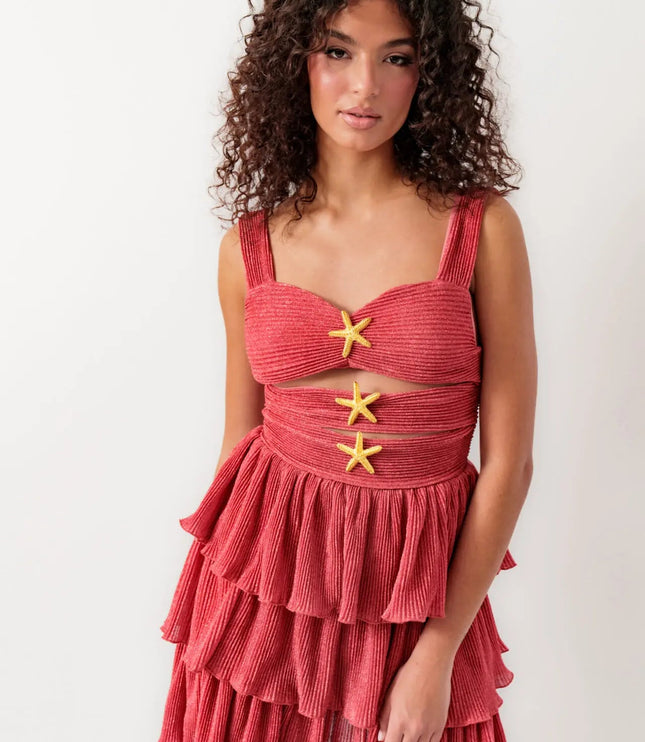 Women's summer cut out mini dress in shimmery coral with tiered ruffles and gold starfish details.