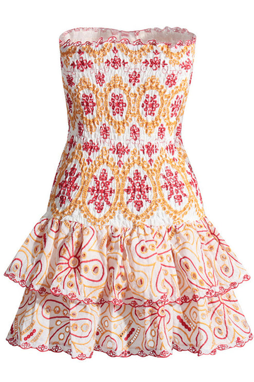 Flat lay front view of a white strapless mini dress with red and orange embroidery, showcasing the shirred top and tiered ruffles.