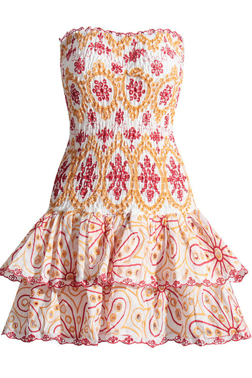 Flat lay front view of a white strapless mini dress featuring red and orange embroidered designs and a layered tiered skirt.