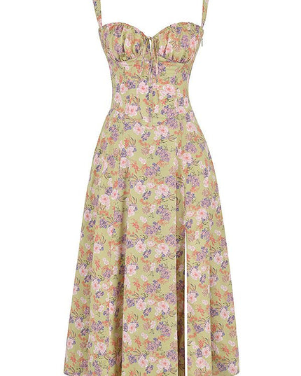 Flat lay of a green floral corset bow front midi dress with pink and purple flower patterns.