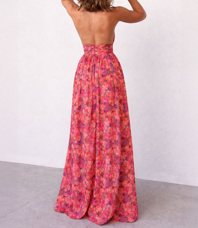 Back view of the women's summer floral halter neck maxi dress, showcasing the open back design and full skirt.