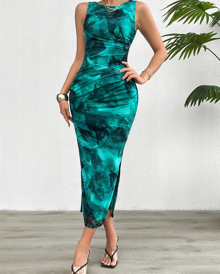 Full-length women's emerald gradient print midi dress, featuring a crew neck and ruched waist, ideal for summer.