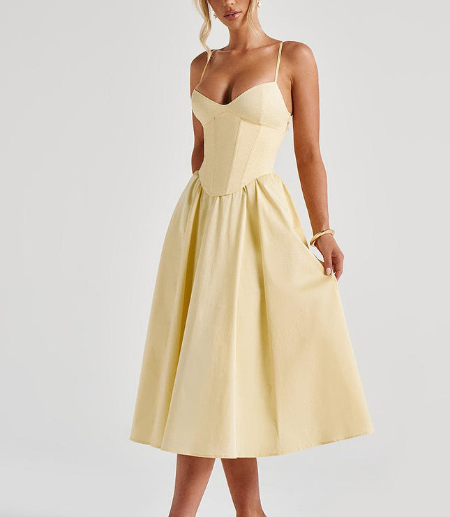Side view of the light yellow sweetheart corset midi dress, highlighting the elegant silhouette and midi length.