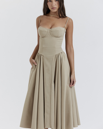 Women's light khaki sweetheart neck corset midi dress featuring a structured bodice and a voluminous skirt with pockets.