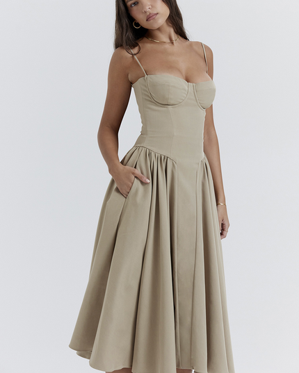 Three-quarter view of a women's light khaki midi dress with a sweetheart neckline and corset-style top, for summer.