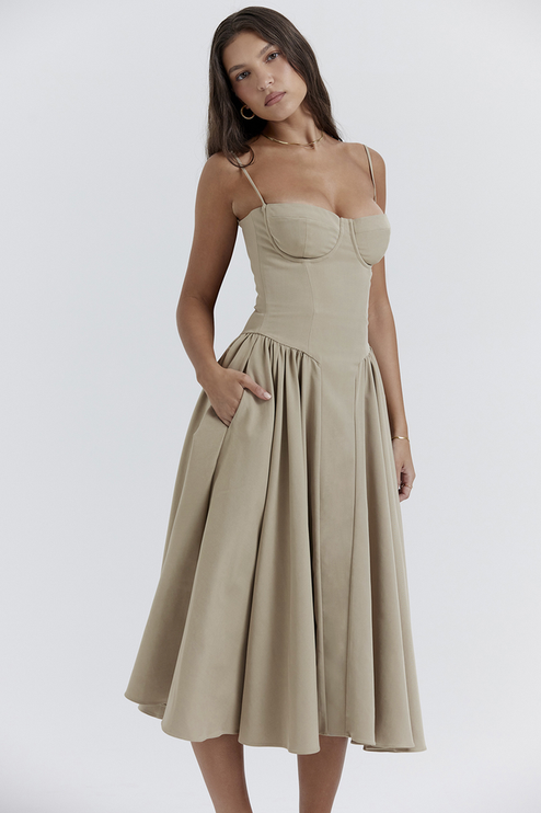Three-quarter view of a women's light khaki midi dress with a sweetheart neckline and corset-style top, for summer.