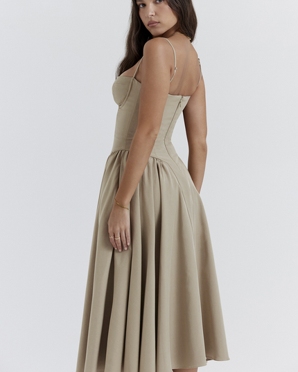Back three-quarter view of the women's light khaki sweetheart neck corset midi dress, showcasing the fitted waist.