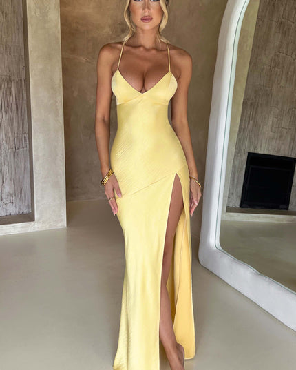 Full-length front view of the yellow V-neck satin maxi dress, highlighting the elegant drape and high slit.