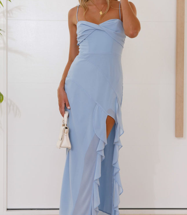 Light blue midi dress for women, featuring delicate spaghetti straps, a ruched bodice, and a flowing ruffled split skirt, ideal for summer wedding guests.
