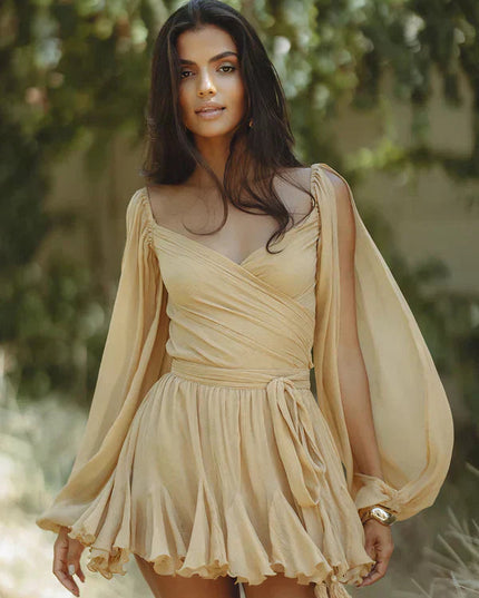 Light beige V-neck mini dress with long open sleeves, a wrap front, and a flounced skirt.