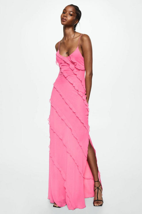 Full-length women's pink maxi dress with spaghetti straps, V-neck, and cascading ruffles, featuring a side slit.
