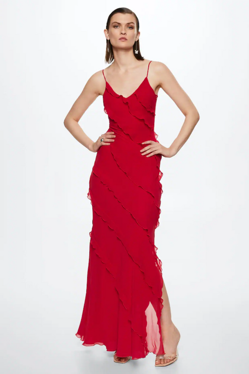 Full body shot of a red V-neck ruffle side slit maxi dress for women, with a sheer overlay.