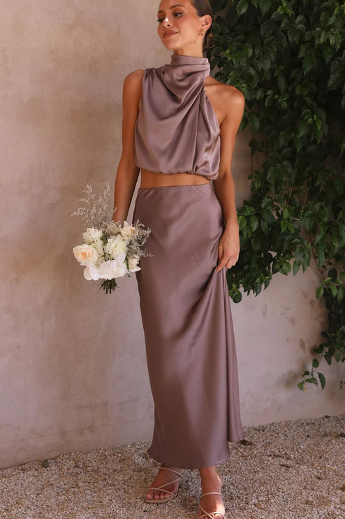 Front view of the taupe satin two-piece maxi set, with a high neck top and matching skirt, ideal for wedding guests.