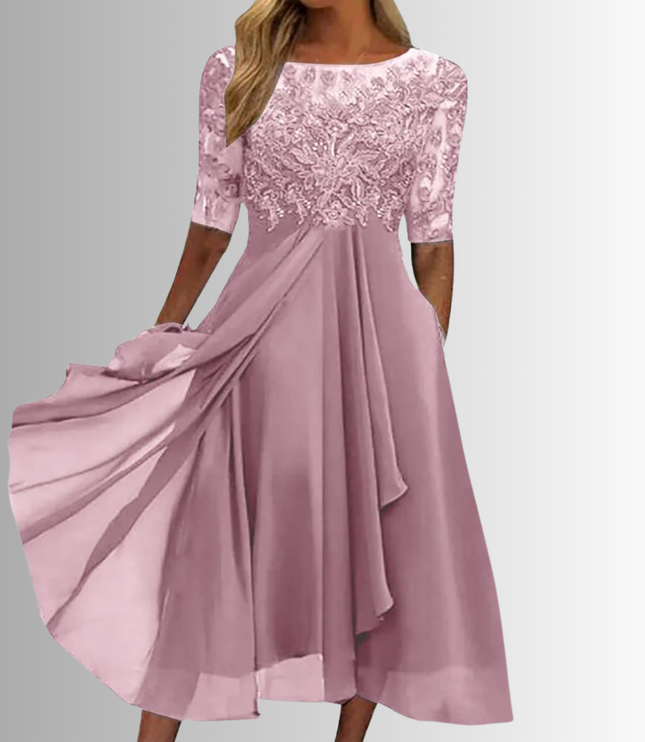 Elegant pink boat neck midi dress for women, featuring a delicate lace top, sheer three-quarter sleeves, and a layered chiffon skirt with side pockets, ideal for a wedding.