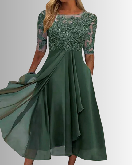 Forest green boat neck midi dress for women, showcasing a beautiful lace design on the top and sheer sleeves, with a graceful chiffon skirt that includes pockets, a lovely wedding guest dress.